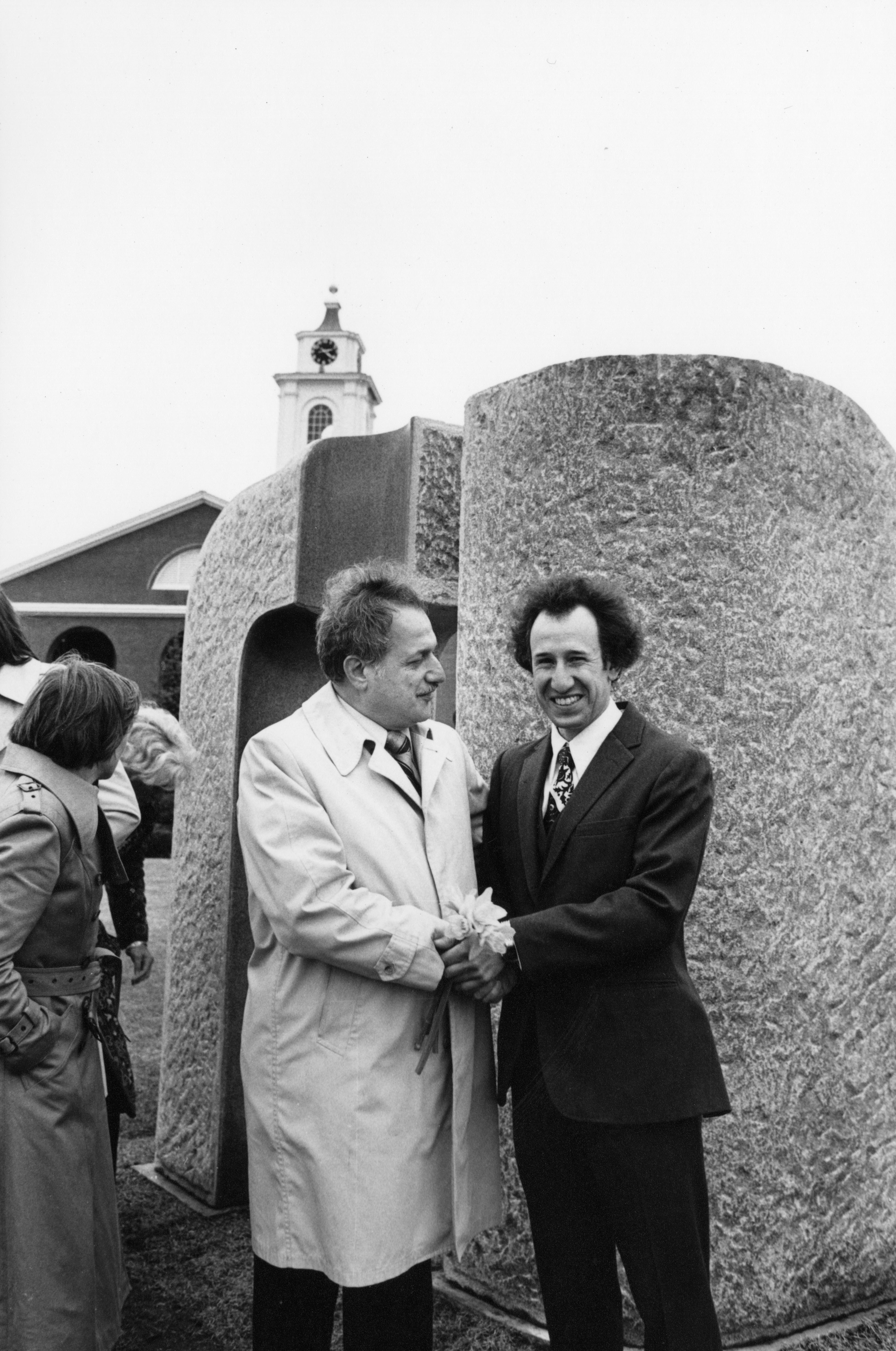 President Adamian and Carlos Dorrien shake hands at the official reception for "Portal" in March, 1980.